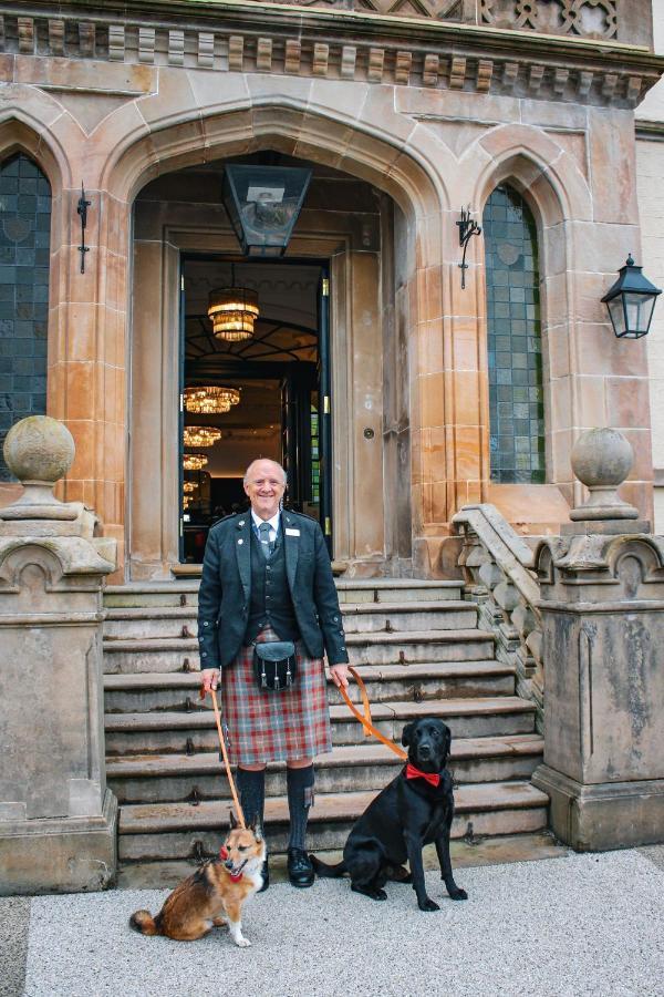 Cameron House On Loch Lomond Alexandria Exterior photo A Scottish doorman in traditional kilt