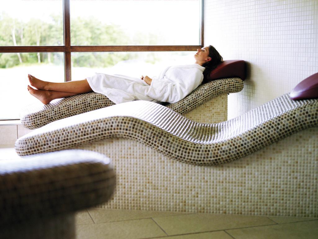Cameron House On Loch Lomond Alexandria Exterior photo A woman relaxing on a spa bed
